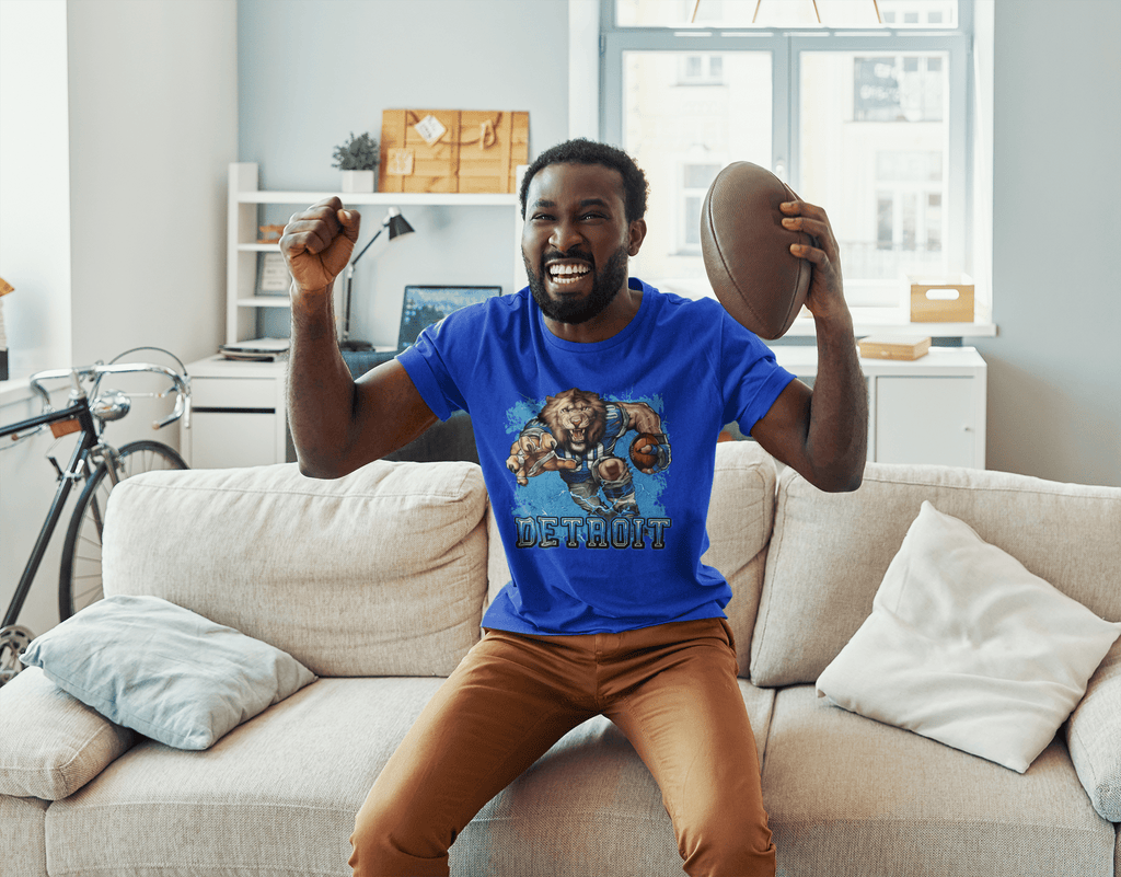 Detroit Football Mascot T-Shirt – Fun Cartoon Lion Fan Tee for Game Day - Stonk Shark Co.